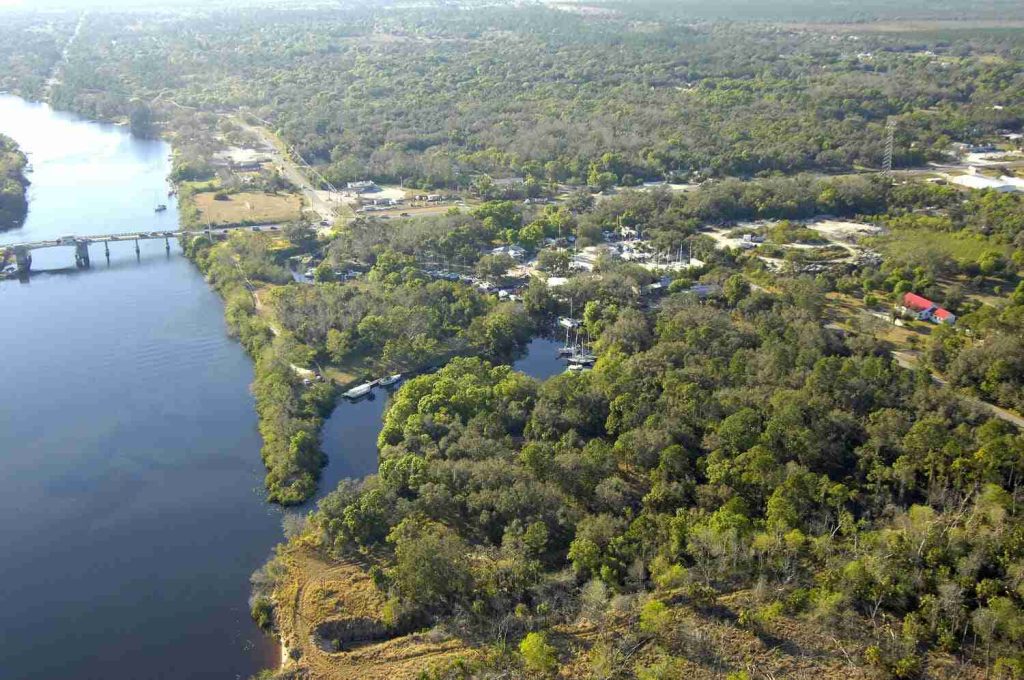Aerial view of the Caloosahatchee River, bridge and riverside marina at LaBelle, Florida